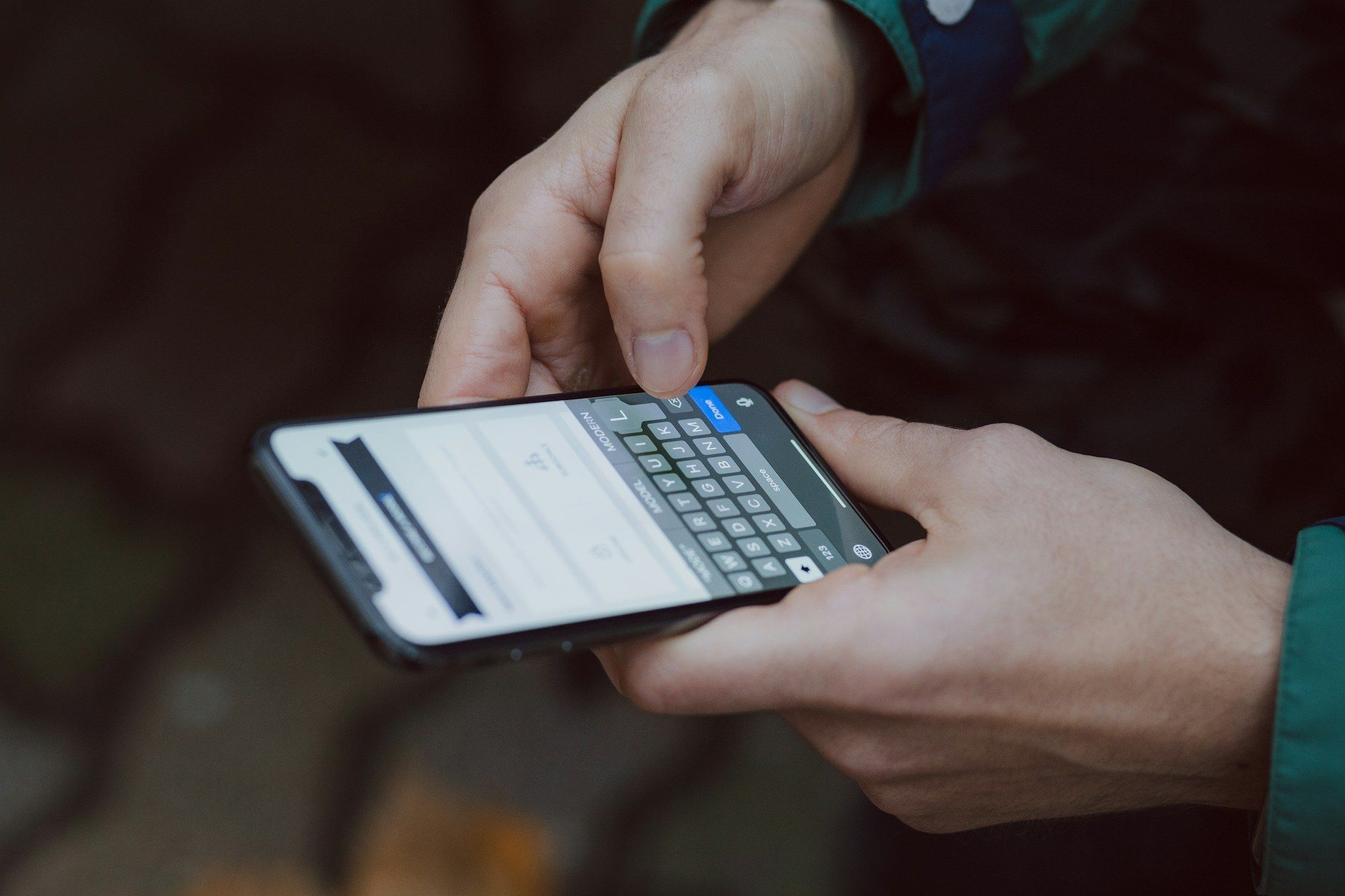 A person reading a text message on their phone